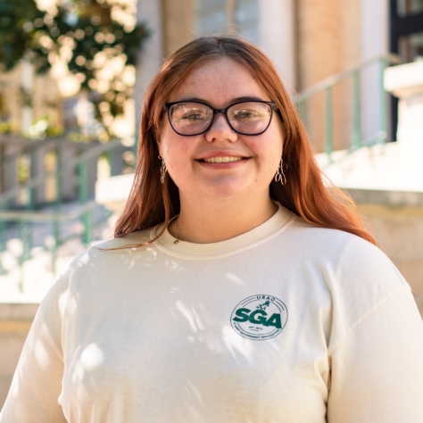 Portrait of Sierra with SGA shirt on